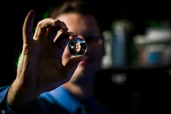 A BYU researcher 'holds' a volumetric display image that seems to float in thin air. A BYU researcher 'holds' a volumetric display image that seems to float in thin air.