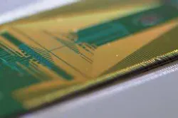 A large-scale integrated silicon-photonic quantum circuit controls multidimensional entanglement of photons. A large-scale integrated silicon-photonic quantum circuit controls multidimensional entanglement of photons.