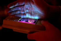 Organic phosphors developed at the University of Michigan glow in blue and orange when triggered by UV light. Organic phosphors developed at the University of Michigan glow in blue and orange when triggered by UV light.