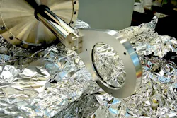 Plano convex lens being installed. Plano convex lens being installed.