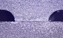 FIGURE 1. A >0.3 mm glass wafer with isotropically etched channels is bonded with room-temperature UV adhesive to a 1-mm-thick glass wafer; the glass:glass bond preserves bioactivity of encapsulated biomolecules/cells. FIGURE 1. A >0.3 mm glass wafer with isotropically etched channels is bonded with room-temperature UV adhesive to a 1-mm-thick glass wafer; the glass:glass bond preserves bioactivity of encapsulated biomolecules/cells.