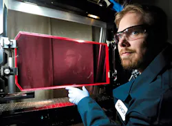 FIGURE 1. Interferometry tests are performed on an LG760 laser glass slab to inspect quality of the glass finish. SCHOTT produces this potassium-barium-aluminum-phosphate-based glass in Duryea, PA. FIGURE 1. Interferometry tests are performed on an LG760 laser glass slab to inspect quality of the glass finish. SCHOTT produces this potassium-barium-aluminum-phosphate-based glass in Duryea, PA.