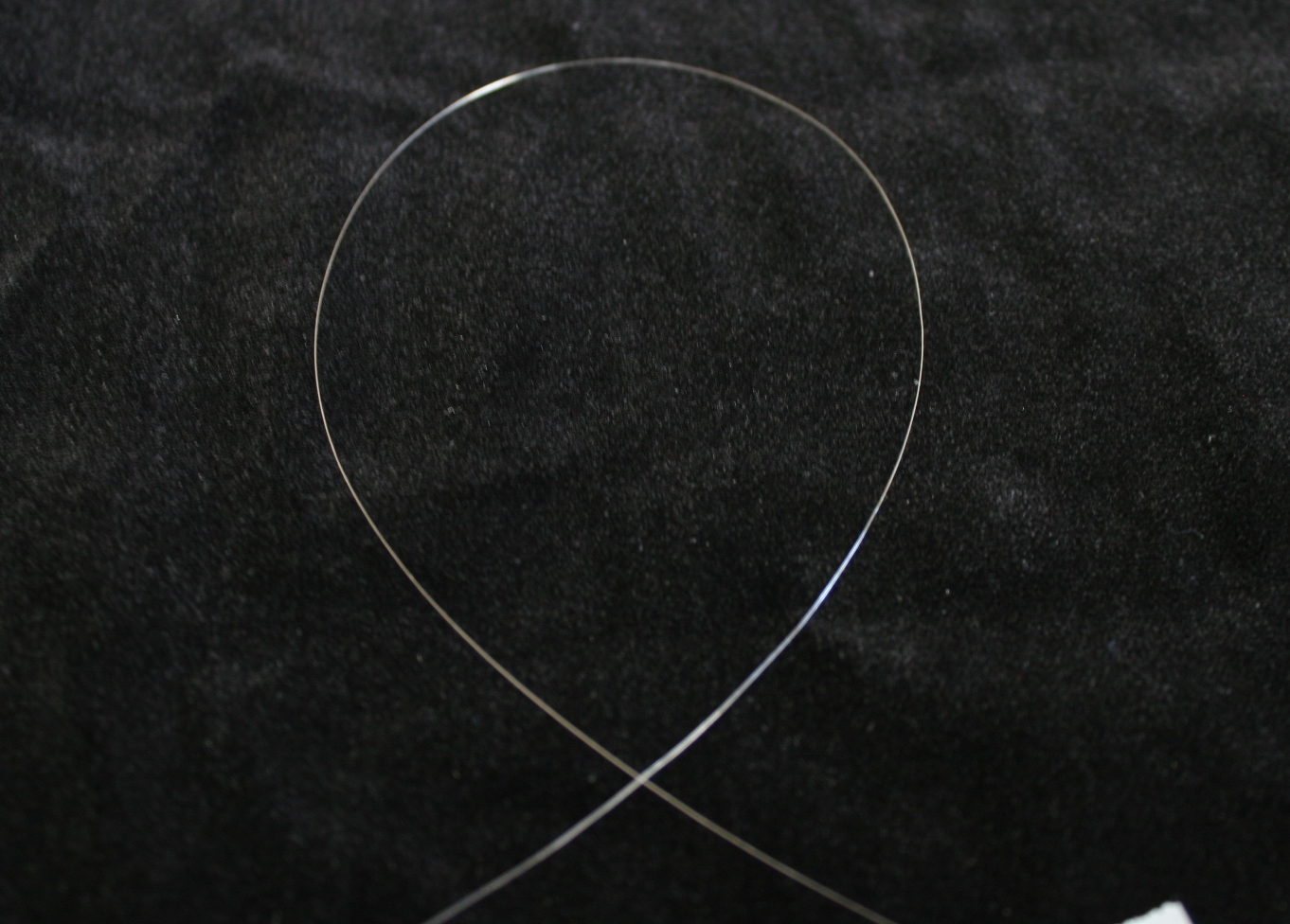 Unclad Yb:YAG single-crystal fiber (SCF) has a diameter of only 100 &mu;m and demonstrates pure waveguided laser operation.