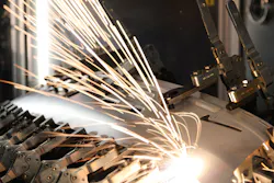 FIGURE 3. A Rofin scanner-based fiber laser welds automotive parts. FIGURE 3. A Rofin scanner-based fiber laser welds automotive parts.