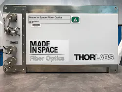 FIGURE 3. The microwave-sized instrument shown was the first Made In Space Fiber Optics payload to go to the International Space Station. FIGURE 3. The microwave-sized instrument shown was the first Made In Space Fiber Optics payload to go to the International Space Station.
