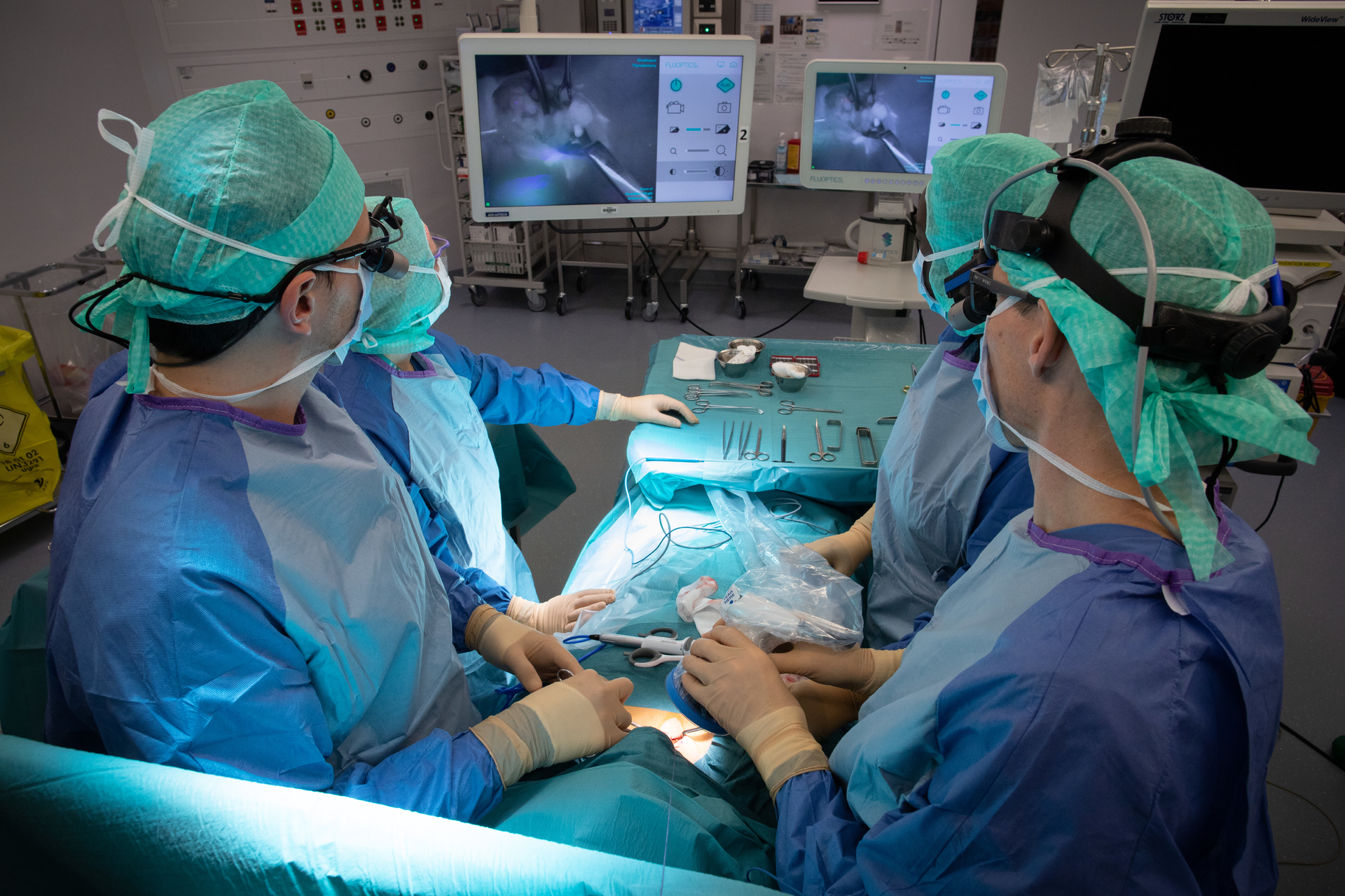 FIGURE 1. Fluorescence-guided surgery promises to reveal specific tissues, here exemplified by the use of the handheld Fluobeam, which integrates 750 nm illumination with an imaging sensor.