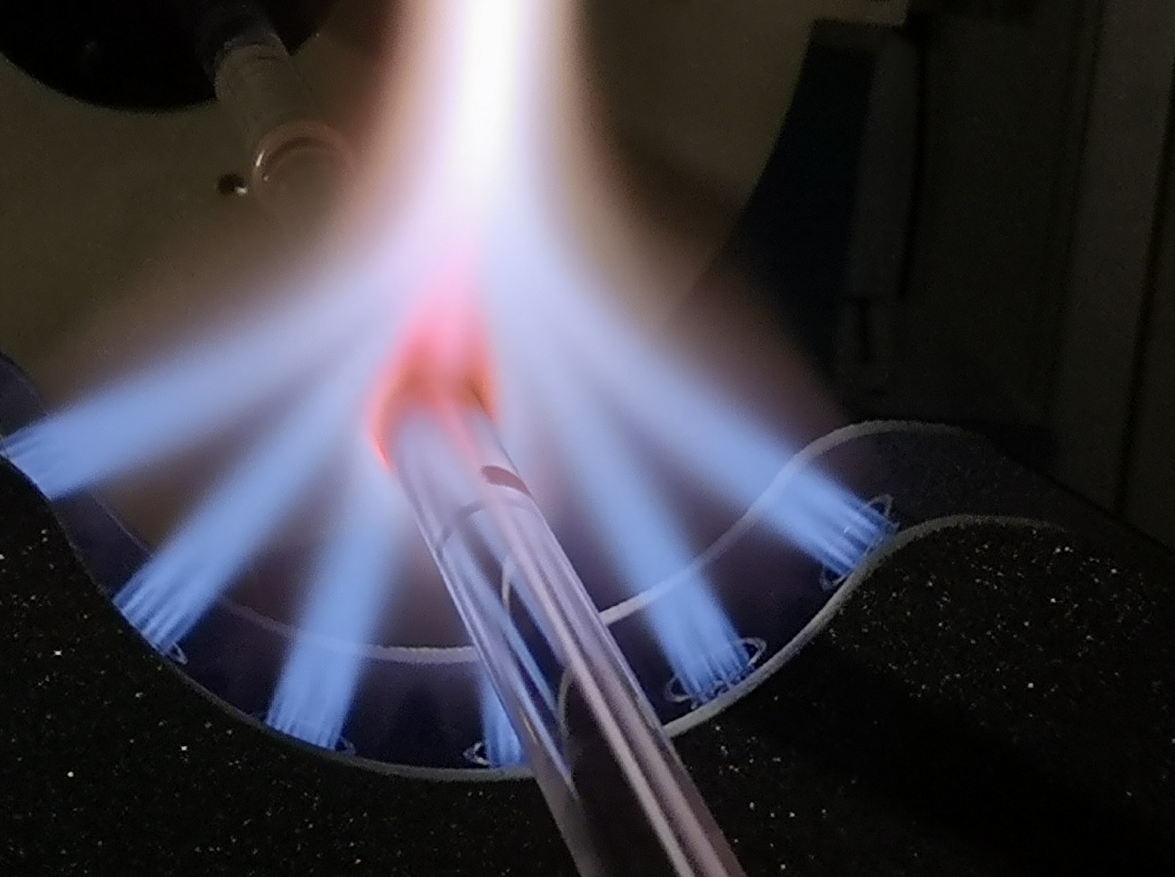 FIGURE 1. Fabrication of a hollow-core NANF fiber.
