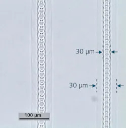 FIGURE 2. Schematic representation of through-transmission laser microwelding of two glass plates. FIGURE 2. Schematic representation of through-transmission laser microwelding of two glass plates.