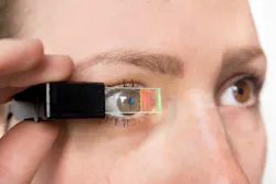 FIGURE 2. Fraunhofer IOF’s demonstrator of a see-through data projector for a smart glass application; in addition to the outcoupling grating, the ultra-compact projection optics in the frame have been also realized by photolithography. FIGURE 2. Fraunhofer IOF’s demonstrator of a see-through data projector for a smart glass application; in addition to the outcoupling grating, the ultra-compact projection optics in the frame have been also realized by photolithography.