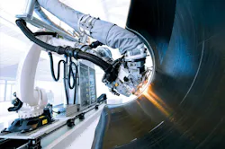 FIGURE 1. An AFP machine for manufacturing curved parts. FIGURE 1. An AFP machine for manufacturing curved parts.