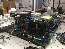 This is the optical setup of a new analog photonic correlator that can locate objects transmitting a radio signal. This is the optical setup of a new analog photonic correlator that can locate objects transmitting a radio signal.