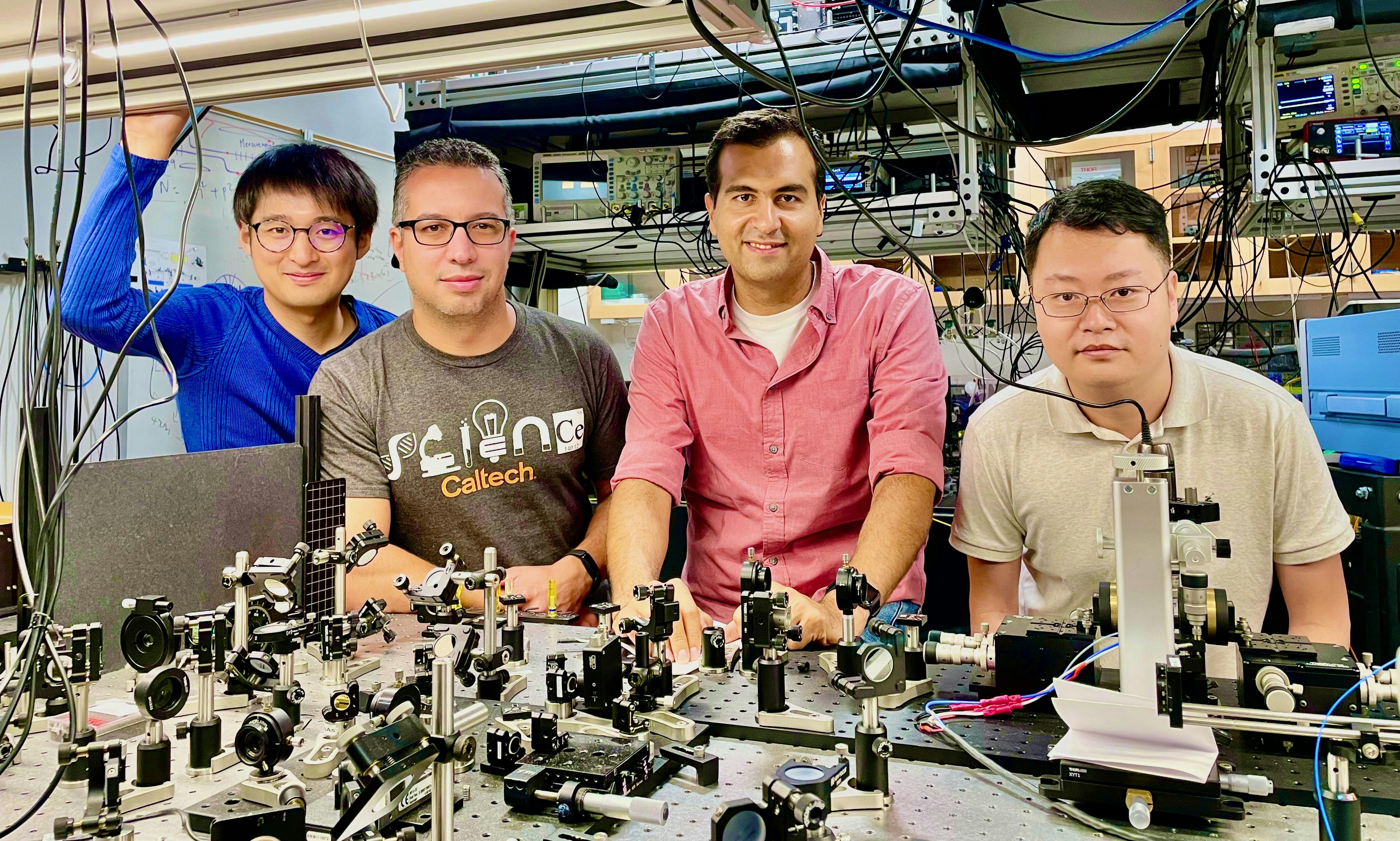 FIGURE 1. In Marandi&rsquo;s lab (from right to left): Q. Guo, A. Marandi, L. Ledezma, and R. Sekine.