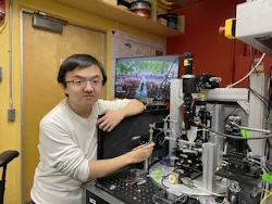 FIGURE 3. Yaowen Hu, a graduate student in Lončar’s Lab, characterizing frequency comb sources. FIGURE 3. Yaowen Hu, a graduate student in Lončar’s Lab, characterizing frequency comb sources.