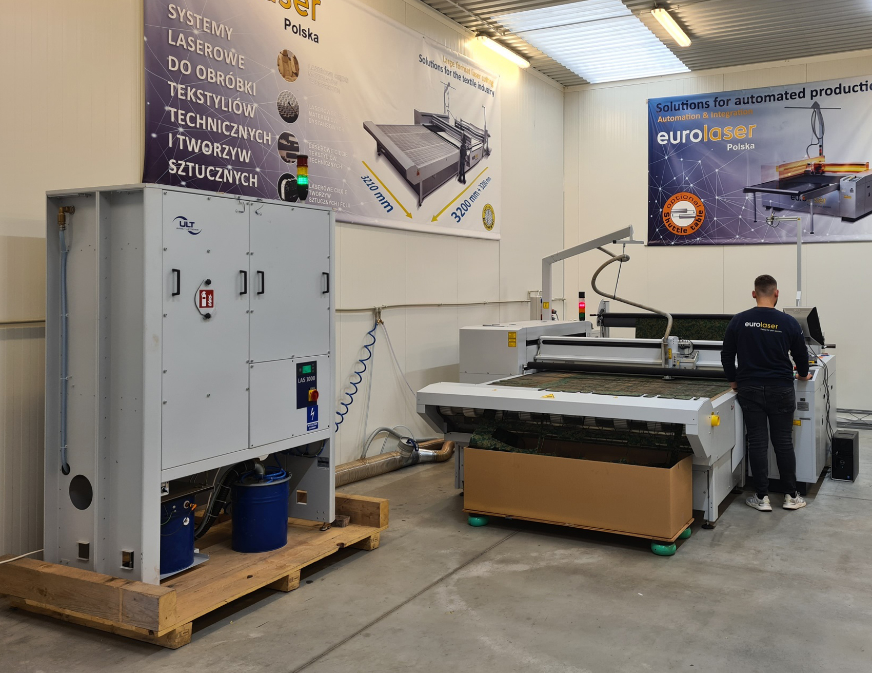 FIGURE 1. The LAS 800 laser fume extractor (left) purifies air from laser fumes and dust.