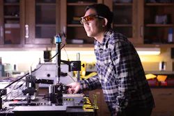 FIGURE 3. Research scientist Shuai Liu tests the quantum chips. FIGURE 3. Research scientist Shuai Liu tests the quantum chips.