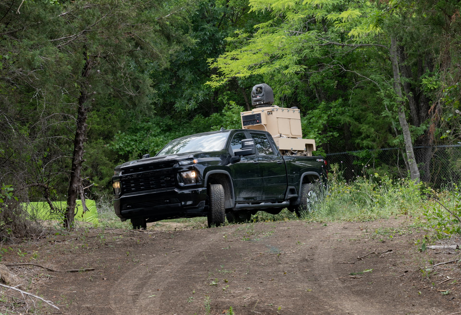 Raytheon developed the H4, a palletized 10 kW high-energy laser weapon system that fits in the back of a pickup, for the U.S. Air Force.