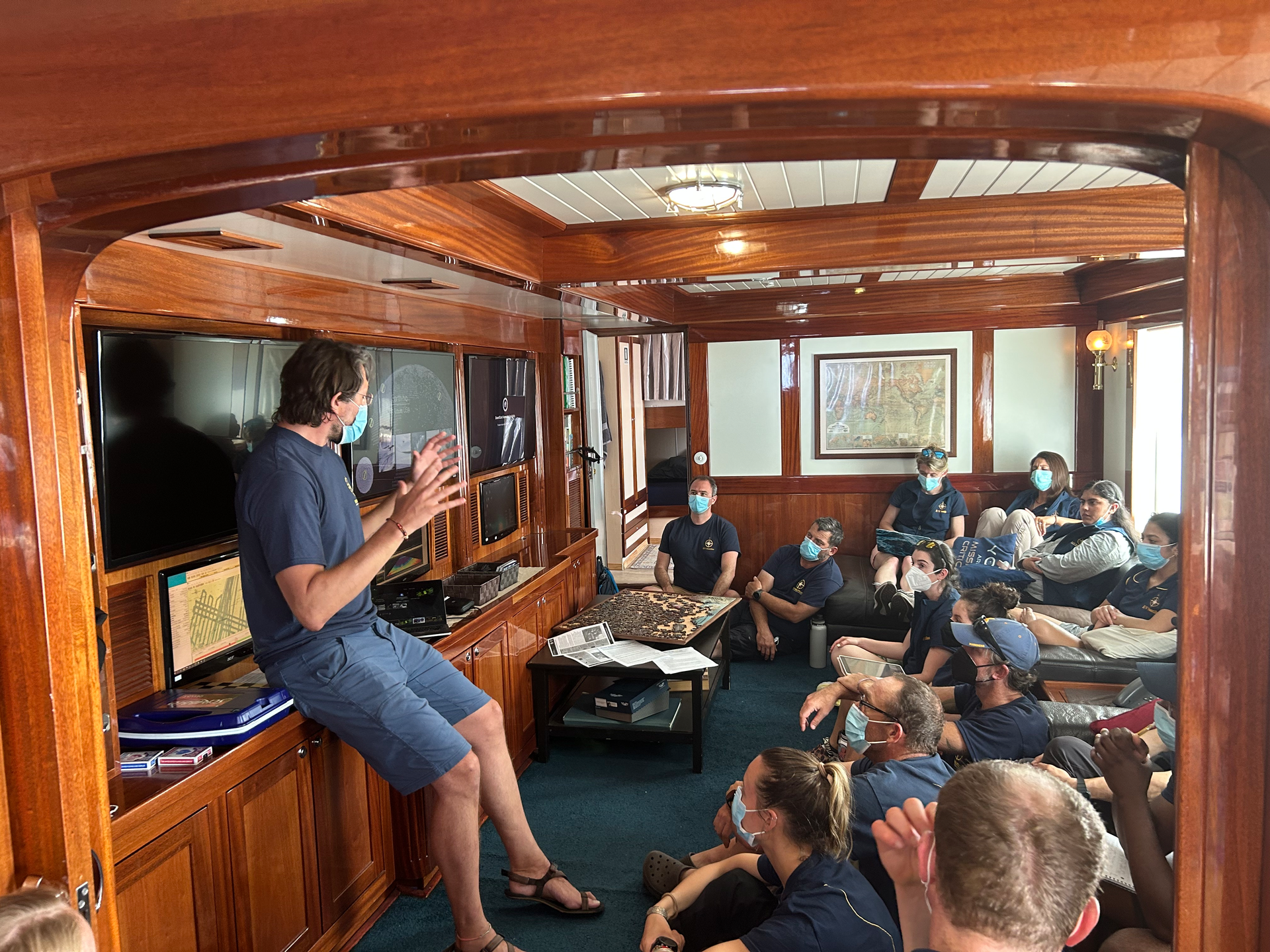 FIGURE 1. InVADER project leader Pablo Sobron explains the system&rsquo;s mission to the team of scientists onboard E/V Nautilus before ocean deployment.