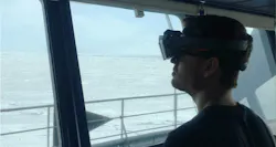 FIGURE 5. Researcher Jon Fauske experiments with AR navigation using the HoloLens 2 with sun screen during bright light conditions in the Arctic. FIGURE 5. Researcher Jon Fauske experiments with AR navigation using the HoloLens 2 with sun screen during bright light conditions in the Arctic.