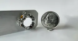 FIGURE 3. A micro gimbal with piezoelectric ultrasonic motors has a total size of only 14 × 14 × 7 mm. FIGURE 3. A micro gimbal with piezoelectric ultrasonic motors has a total size of only 14 × 14 × 7 mm.