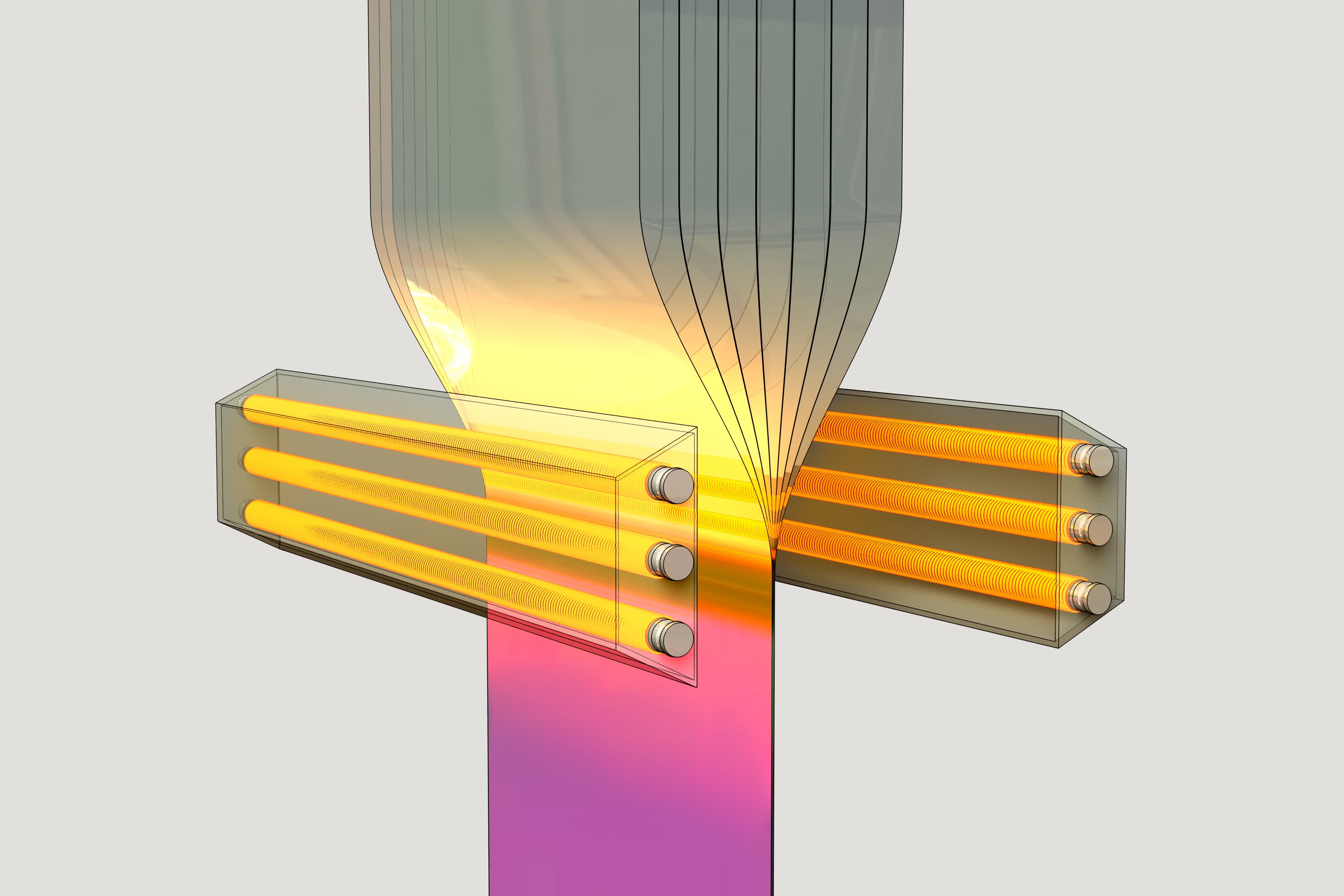 FIGURE 1. A monolithic polymer stack is drawn in one direction through a heating zone to form the filters.