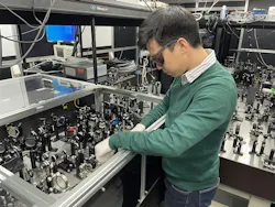 FIGURE 1. Keitaro Shimada working on an ultrafast imaging system using the spectrum shuttle. FIGURE 1. Keitaro Shimada working on an ultrafast imaging system using the spectrum shuttle.