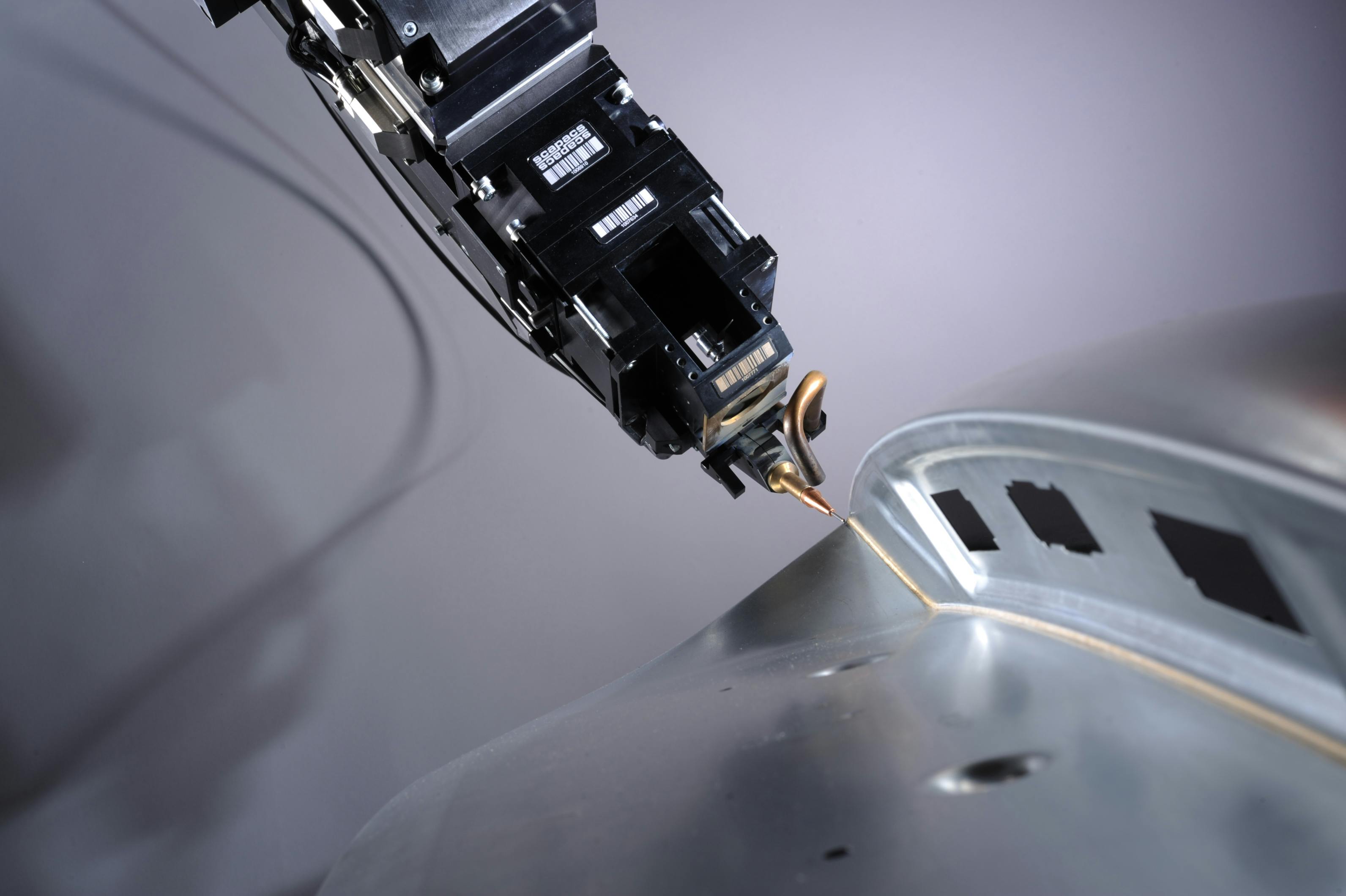 FIGURE 1. Adaptive laser optics follow the 3D contour. Its camera sends live images to a neural network, which detects defects from a laser brazing process in real time.