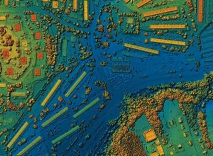 LiDAR mapping: Aerial drone photos processed into GIS 3D illustration of urban area, highlighting roads, junctions, and dense infrastructure.