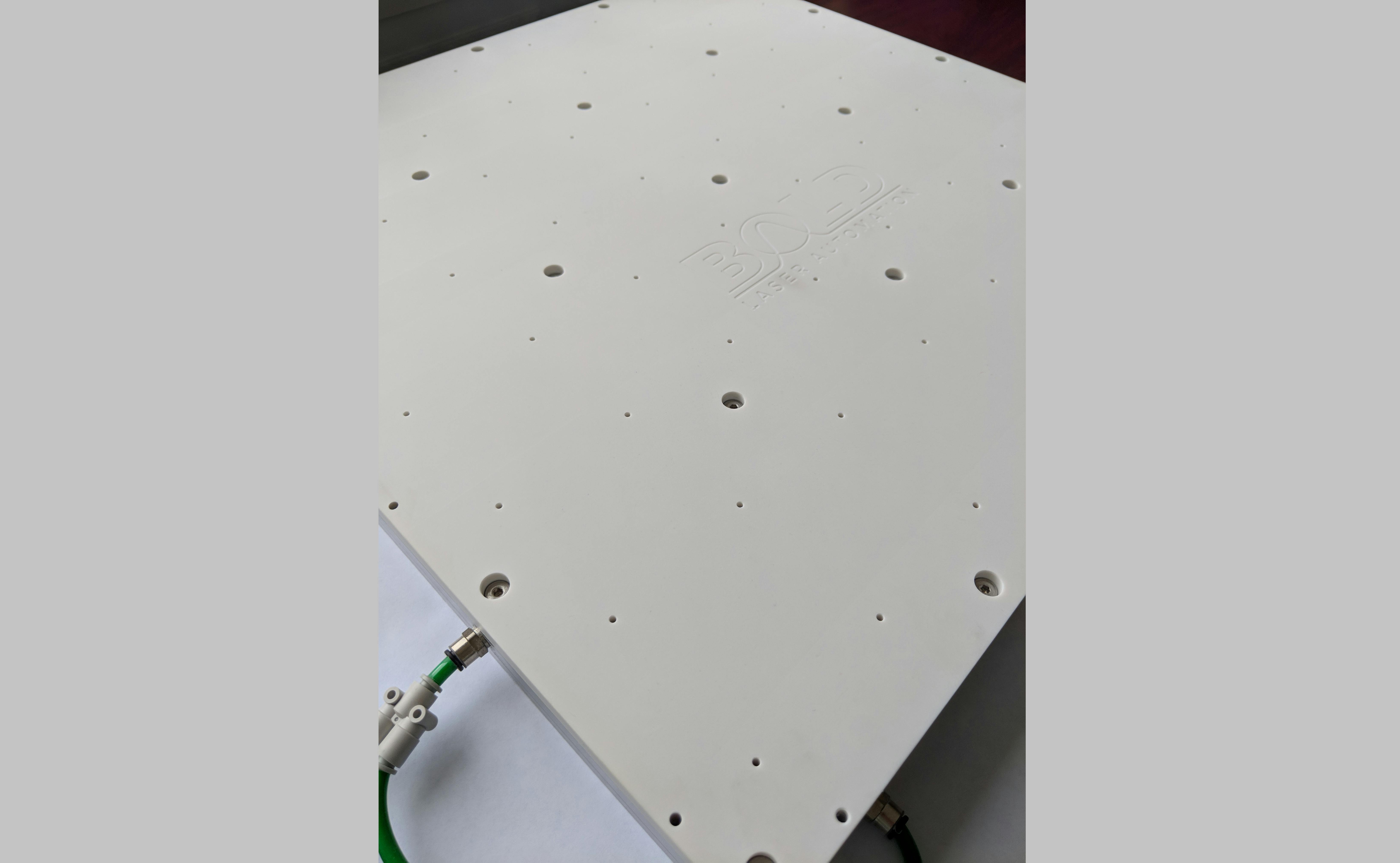 FIGURE 1. Medium-size (600 &times; 600-mm) PTFE vacuum chuck.