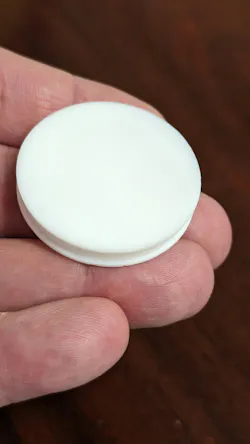 FIGURE 2. Corner puck for use with aluminum vacuum chucks (center at substrate corners). FIGURE 2. Corner puck for use with aluminum vacuum chucks (center at substrate corners).