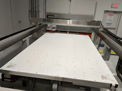 FIGURE 4. A large-scale PTFE G400 laser vacuum chuck (>1.2 × 2.3 m) for large sheets of thin glass. FIGURE 4. A large-scale PTFE G400 laser vacuum chuck (>1.2 × 2.3 m) for large sheets of thin glass.