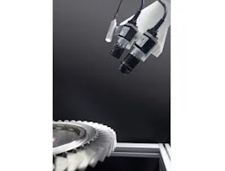 A prototype adaptable modular inspection system inspects the surface of a bladed integrated disk (BLISK) with two cameras and a light source. A prototype adaptable modular inspection system inspects the surface of a bladed integrated disk (BLISK) with two cameras and a light source.