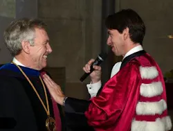 President Dean Lewis of the University of Bordeaux vests Professor Martin Richardson of the University of Central Florida with the insignia of a 'Docteur Honoris Causa' of the University of Bordeaux. President Dean Lewis of the University of Bordeaux vests Professor Martin Richardson of the University of Central Florida with the insignia of a 'Docteur Honoris Causa' of the University of Bordeaux.