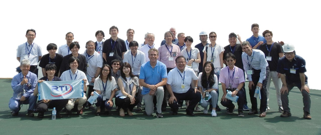 The JGA North cable loading ceremony attracted members of the WIDE Project, RTI management, and representatives from NEC and OCC.