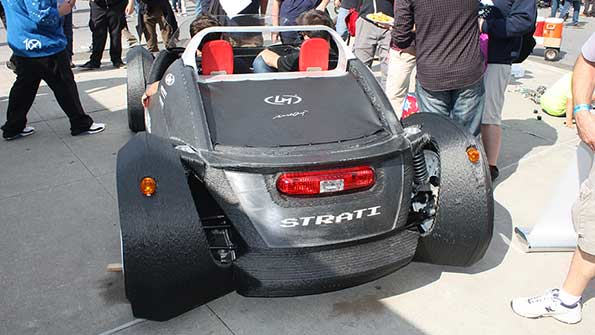 At Maker Faire 2014 held at the NY Hall of Science Local Motors showed off The Strati a vehicle that was entirely 3D printed minus the mechanical components