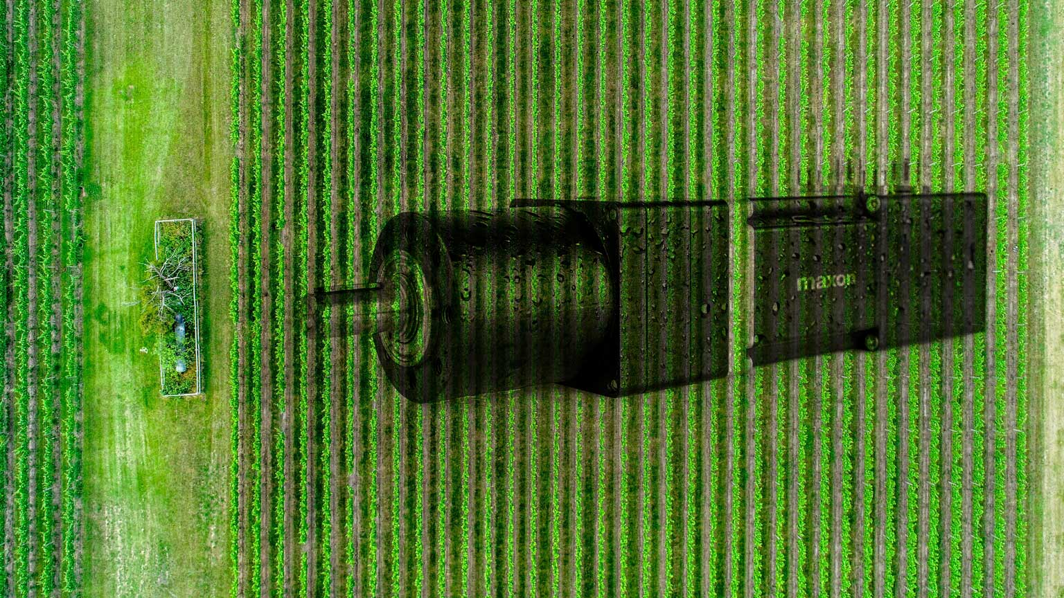 maxon IDX motor superimposed over farmland