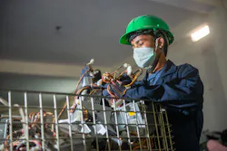 Worker disposing of a product Worker disposing of a product