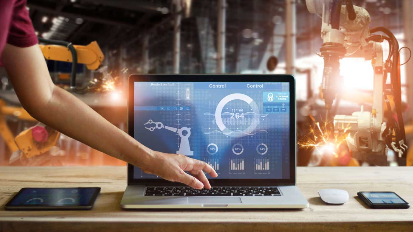 Engineer touching laptop