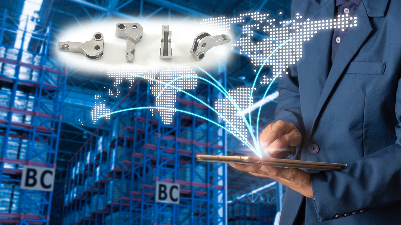 Businessman using tablet, with image of 3DEO parts superimposed