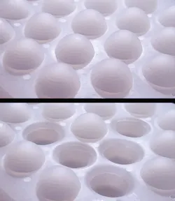 A 3D printer was used to cast one of the soft transducer layers (the bistable dome array). A 3D printer was used to cast one of the soft transducer layers (the bistable dome array).