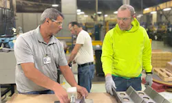 Darrell Cojocar, MMI job coach (left) and Matt Mangus, MMI employee (right). Darrell Cojocar, MMI job coach (left) and Matt Mangus, MMI employee (right).