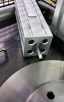 Cracks, flaws and other anomalies can be identified through frequency inspection. Here a force is applied to a brake rotor to measure its resonance frequency. Cracks, flaws and other anomalies can be identified through frequency inspection. Here a force is applied to a brake rotor to measure its resonance frequency.