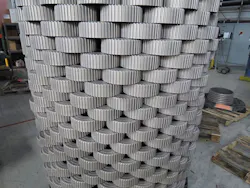 Transmission hubs are gas nitrided in stacks, which lets nitriding gases flow between parts to fully treat the surfaces. Parts are stacked as high as the vessel’s working volume will allow to maximize efficiency. Transmission hubs are gas nitrided in stacks, which lets nitriding gases flow between parts to fully treat the surfaces. Parts are stacked as high as the vessel’s working volume will allow to maximize efficiency.