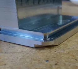 This part has an undercut feature that cannot be reached in the machining process. This part has an undercut feature that cannot be reached in the machining process.