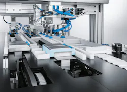 Multi-head Festo Cartesian robot performs picking-and-placing actions. Multi-head Festo Cartesian robot performs picking-and-placing actions.