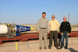 Dr. John Granier and a couple of colleagues pose in front of a warhead package on a rocket sled track at Hollomon AFB in New Mexico. The nose cone is a fixture just for making the test work to get the warhead to speed for dynamic explosive testing at the end of the track. Dr. John Granier and a couple of colleagues pose in front of a warhead package on a rocket sled track at Hollomon AFB in New Mexico. The nose cone is a fixture just for making the test work to get the warhead to speed for dynamic explosive testing at the end of the track.