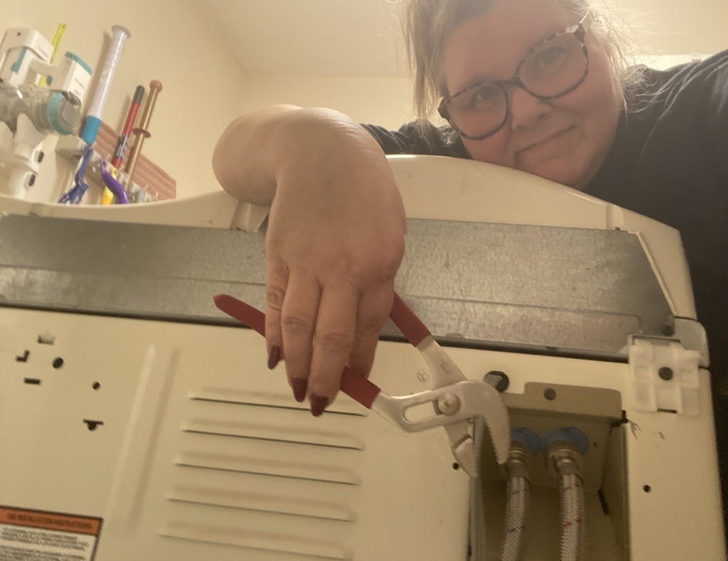 Moving my front-loader away from the wall one last time. Our new machines will be installed soon. Merry Christmas to me?