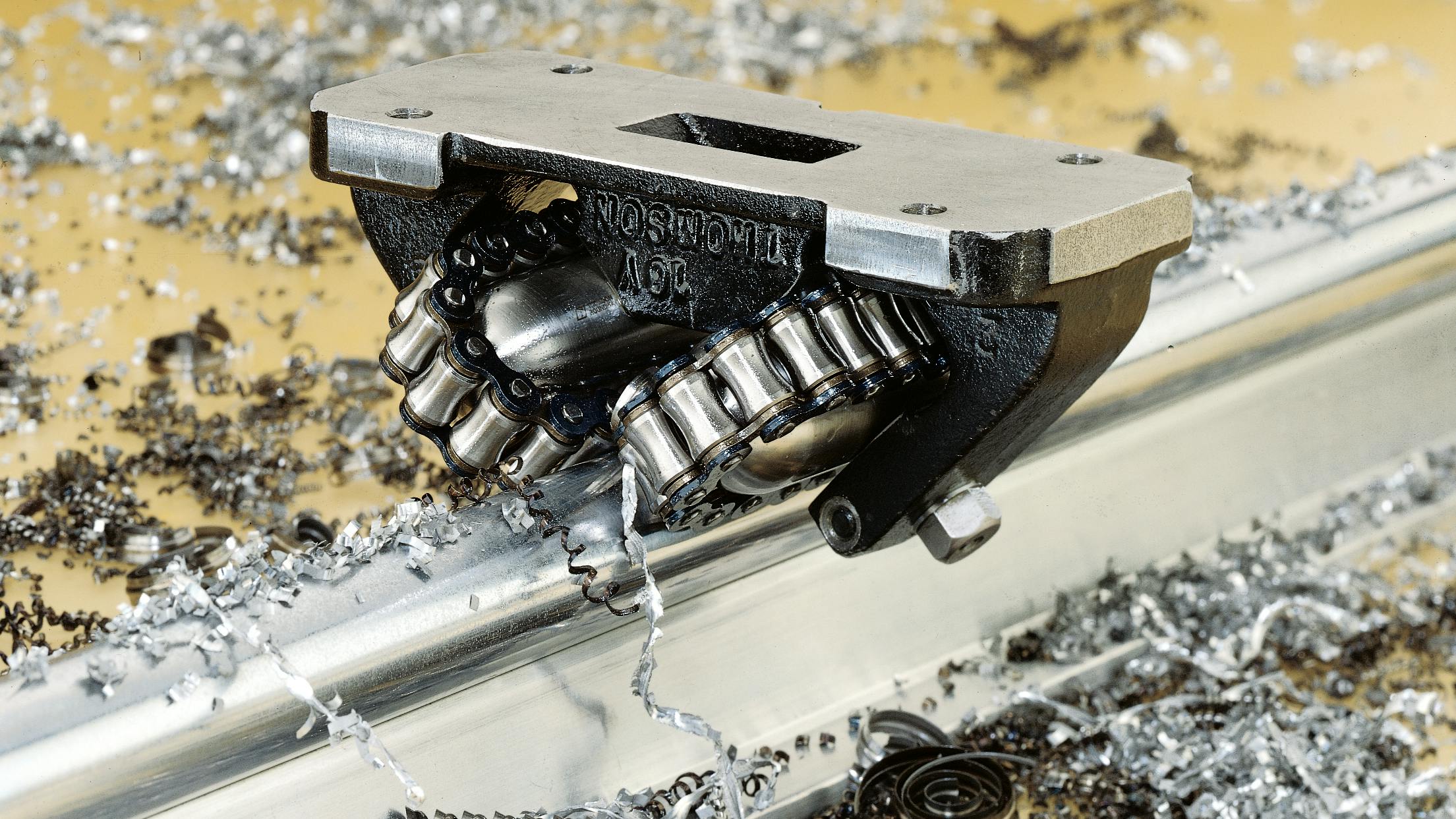 This Thomson linear bearing leverages concave rollers to move a sawlog at up to 20 times the load capacity of conventional linear ball bearings and reach speeds of 100 ft/sec.