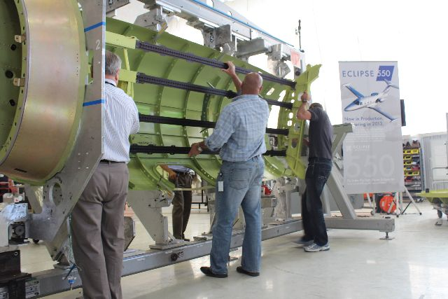Content Dam Avi Online Articles 2012 06 Eai Staff Perform First Fuselage Assembly Sn1001