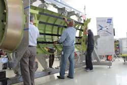 Content Dam Avi Online Articles 2012 06 Eai Staff Perform First Fuselage Assembly Sn1001 Content Dam Avi Online Articles 2012 06 Eai Staff Perform First Fuselage Assembly Sn1001