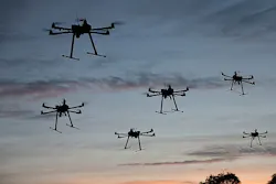 DARPA seeks to develop ways to swarm unmanned vehicles for better military reconnaissance DARPA seeks to develop ways to swarm unmanned vehicles for better military reconnaissance